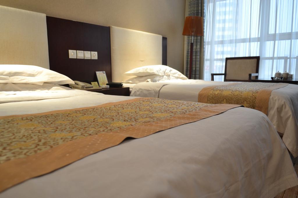 Datong Jinhe Kailong Hotel Habitación foto